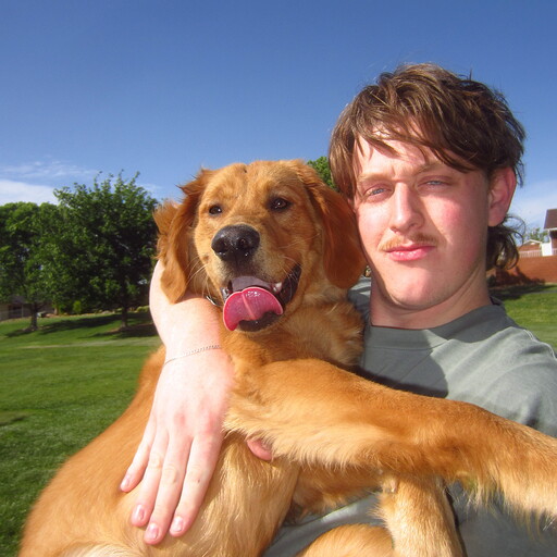 Luke Sampson and his dog, Holt